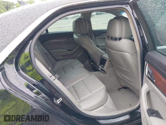 2014 Cadillac CTS AWD z VIN 1G6AW5SX4E0129136, wystawiony jako IAAI lot #42364098 z przebiegiem 137 080 mil mil oraz . Historia ofert i sprzedaży dostępna na DreamBid. Obrazek 8.