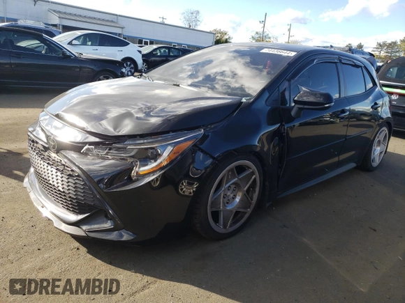 2022 Toyota Corolla Hatchback SE with VIN JTND4MBEXN3180370, listed as a Copart auction lot 74436644 with 57,563 mi miles and Salvage Title. Bid and sale history available at carsss.com. Image 1.