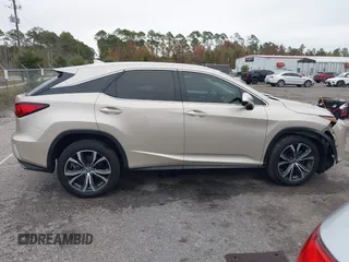 2018 Lexus RX with VIN 2T2ZZMCA9JC099803, listed as a IAAI auction lot 41052078 with 32,423 mi miles. Bid and sale history available at carsss.com. Image 13.