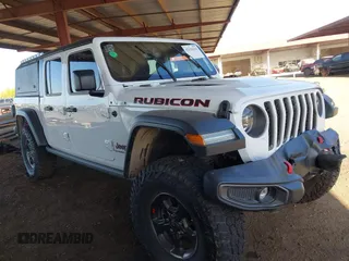 2022 Jeep Gladiator Rubicon с VIN 1C6JJTBM6NL145009, выставлен на аукционе IAAI как лот 42134143 с пробегом 59 438 миль миль и . История ставок и продаж доступна на DreamBid. Изображение 1.