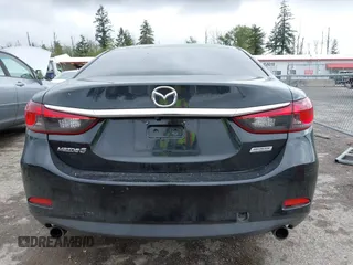 2016 Mazda 6 i Sport with VIN JM1GJ1U53G1451578, listed as a IAAI auction lot 42134810 with 113,144 mi miles and . Bid and sale history available at DreamBid. Image 16.