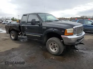 2000 Ford F-250 XL with VIN 1FTNX21L5YEC66604, listed as a Copart auction lot 51754055 with 167,798 mi miles and Salvage title. Bid and sale history available at DreamBid. Image 4.