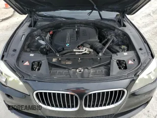 2015 BMW 7 Series 740i with VIN WBAYA6C50FD826727, listed as a Copart auction lot 82197433 with 241,799 mi miles and . Bid and sale history available at DreamBid. Image 11.