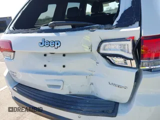 2022 Jeep Grand Cherokee Laredo X z VIN 1C4RJFAG7NC149692, wystawiony jako IAAI lot #42119197 z przebiegiem 37 835 mil mil oraz . Historia ofert i sprzedaży dostępna na DreamBid. Obrazek 17.