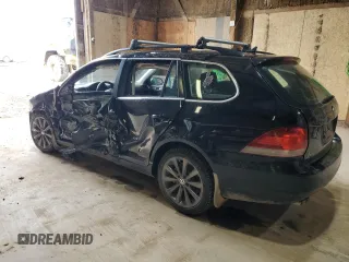 2014 Volkswagen Jetta SportWagen TDI w/Sunroof & Nav with VIN 3VWPL7AJ2EM617990, listed as a Copart auction lot 56214304 with 90,973 mi miles and Salvage Title. Bid and sale history available at carsss.com. Image 2.