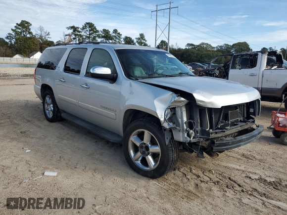 2014 Chevrolet Suburban LTZ with VIN 1GNSCKE02ER141764, listed as a Copart auction lot 85005524 with 234,019 mi miles and Salvage title. Bid and sale history available at DreamBid. Image 4.