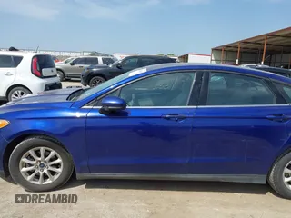 2016 Ford Fusion S z VIN 3FA6P0G7XGR263248, wystawiony jako IAAI lot #42020410 z przebiegiem 167 430 mil mil oraz . Historia ofert i sprzedaży dostępna na DreamBid. Obrazek 14.