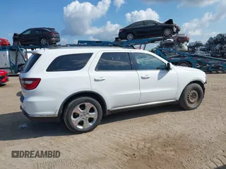 2014 Dodge Durango Limited with VIN 1C4RDJDGXEC323129, listed as a IAAI auction lot 42318727 with 148,451 mi miles and . Bid and sale history available at DreamBid. Image 14.