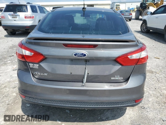 2012 Ford Focus SE with VIN 1FAHP3F20CL461605, listed as a Copart auction lot 59574835 with 119,881 mi miles and Salvage title. Bid and sale history available at DreamBid. Image 6.