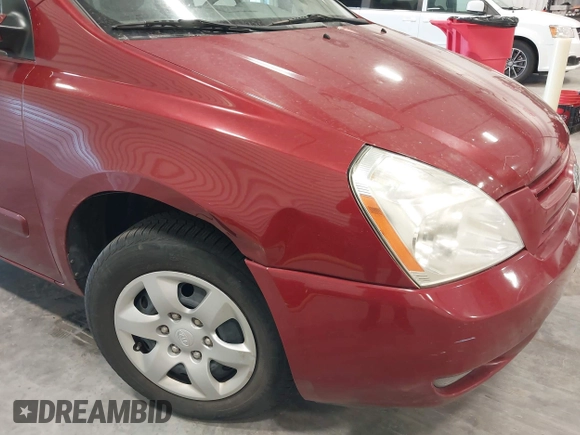 2010 Kia Sedona LX with VIN KNDMG4C35A6343380, listed as a IAAI auction lot 42042669 with 119,648 mi miles. Bid and sale history available at carsss.com. Image 6.
