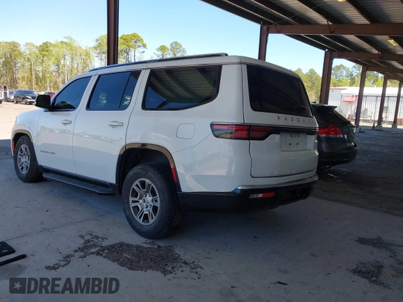 2023 Jeep Grand Wagoneer with VIN 1C4SJUAT5PS509425, listed as a IAAI auction lot 41765704 with 65,656 mi miles and . Bid and sale history available at DreamBid. Image 3.