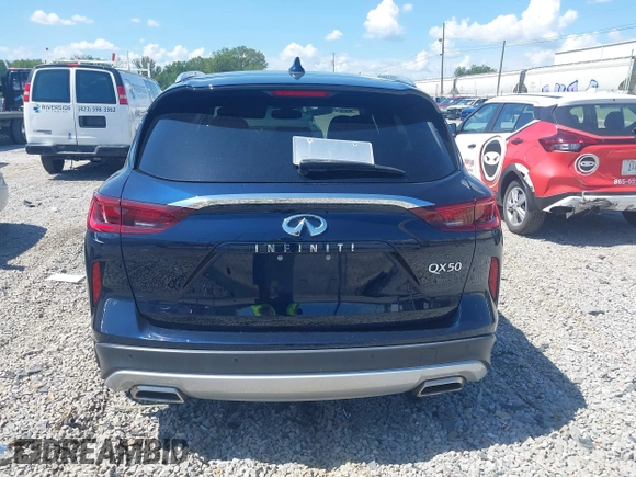 2022 Infiniti QX50 Luxe z VIN 3PCAJ5BA9NF108288, wystawiony jako IAAI lot #42646497 z przebiegiem 65 145 mil mil oraz . Historia ofert i sprzedaży dostępna na DreamBid. Obrazek 16.