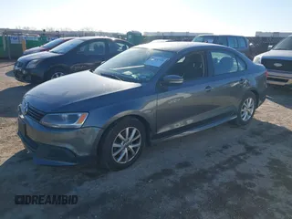 2012 Volkswagen Jetta Sedan SE w/Convenience & Sunroof with VIN 3VWDX7AJ6CM352155, listed as a IAAI auction lot 41461720 with 1 mi miles. Bid and sale history available at carsss.com. Image 2.