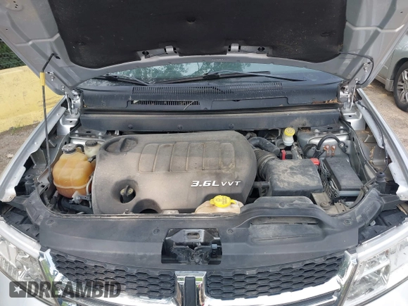 2012 Dodge Journey SXT with VIN 3C4PDDBG1CT323727, listed as a IAAI auction lot 42473238 with 77,035 mi miles and . Bid and sale history available at DreamBid. Image 10.