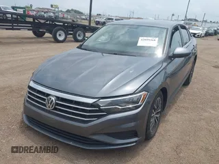 2021 Volkswagen Jetta S with VIN 3VWC57BU3MM067408, listed as a IAAI auction lot 42099368 with 34,879 mi miles and . Bid and sale history available at DreamBid. Image 2.