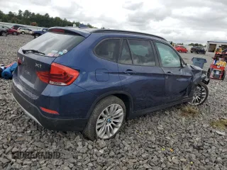 2014 BMW X1 xDrive28i z VIN WBAVL1C5XEVY10401, wystawiony jako Copart lot #72588914 z przebiegiem Nie podano mil oraz Szkody całkowita. Historia ofert i sprzedaży dostępna na DreamBid. Obrazek 3.