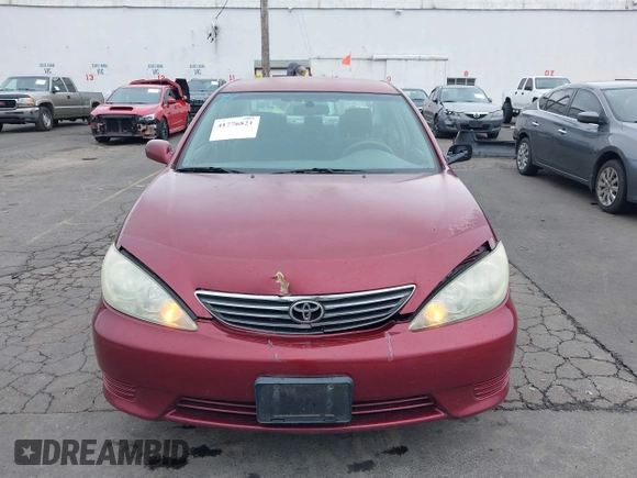 2006 Toyota Camry STD with VIN 4T1BE32K66U124135, listed as a IAAI auction lot 41776821 with 128,845 mi miles. Bid and sale history available at carsss.com. Image 12.