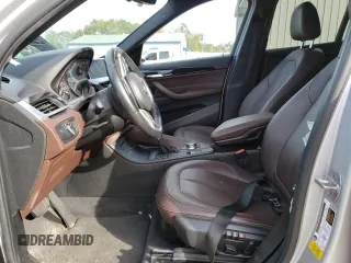 2017 BMW X1 sDrive28i with VIN WBXHU7C30H5H37516, listed as a Copart auction lot 68677332 with 0 mi miles. Bid and sale history available at carsss.com. Image 7.