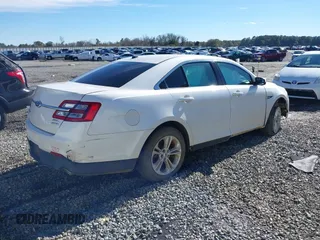 2013 Ford Taurus SEL with VIN 1FAHP2E87DG221557, listed as a IAAI auction lot 41331531 with 152,879 mi miles. Bid and sale history available at carsss.com. Image 4.