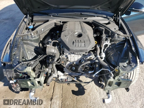 2023 Genesis G70 2.0T with VIN KMTG34TA5PU129955, listed as a Copart auction lot 82980774 with 12,625 mi miles and Salvage Title. Bid and sale history available at DreamBid. Image 11.