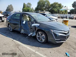 2018 Honda Clarity Plug-In Hybrid Touring with VIN JHMZC5F36JC009488, listed as a Copart auction lot 69550083 with 100,801 mi miles. Bid and sale history available at carsss.com. Image 4.