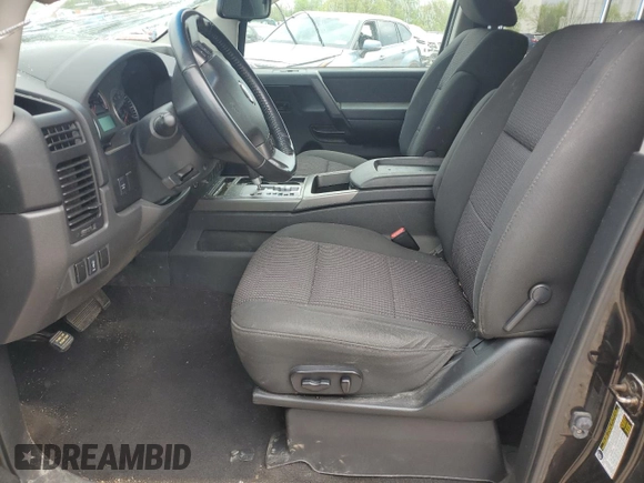 2012 Nissan Titan SV z VIN 1N6AA0EC0CN311288, wystawiony jako Copart lot #56845405 z przebiegiem 71 180 mil mil oraz Szkoda całkowita • Salvage title. Historia ofert i sprzedaży dostępna na DreamBid. Obrazek 7.
