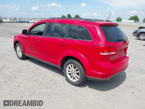 2013 Dodge Journey SXT with VIN 3C4PDDBGXDT641427, listed as a IAAI auction lot 42604902 with 149,256 mi miles and . Bid and sale history available at DreamBid. Image 3.