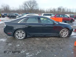 2016 Lincoln MKZ z VIN 3LN6L2JK8GR602793, wystawiony jako IAAI lot #41744058 z przebiegiem 105 234 mil mil oraz . Historia ofert i sprzedaży dostępna na DreamBid. Obrazek 13.