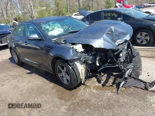 2015 Kia Optima LX with VIN KNAGM4A74F5569738, listed as a IAAI auction lot 41980622 with 161,434 mi miles. Bid and sale history available at carsss.com. Image 1.