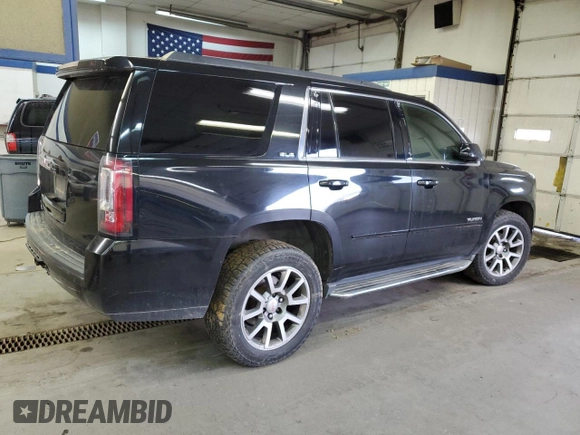 2015 GMC Yukon SLE with VIN 1GKS2AKC6FR229744, listed as a Copart auction lot 88270295 with 215,762 mi miles and Salvage Title. Bid and sale history available at DreamBid. Image 3.