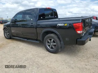 2015 Nissan Titan SL with VIN 1N6AA0EC8FN501862, listed as a Copart auction lot 51870185 with 178,187 mi miles and Salvage Title. Bid and sale history available at carsss.com. Image 2.