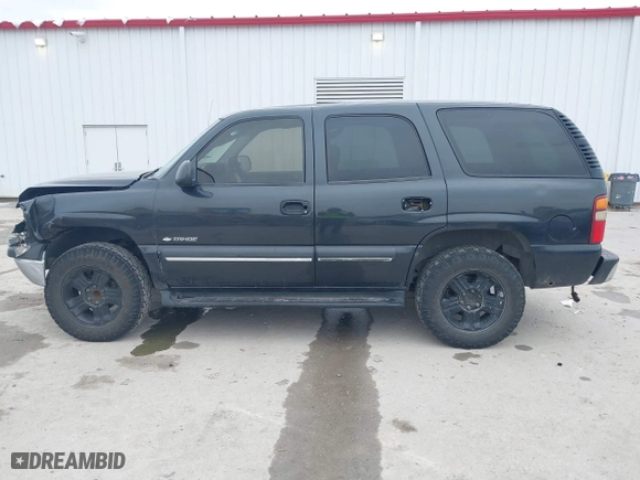 2003 Chevrolet Tahoe LS with VIN 1GNEC13V73R139530, listed as a IAAI auction lot 41598138 with 337,245 mi miles. Bid and sale history available at carsss.com. Image 14.