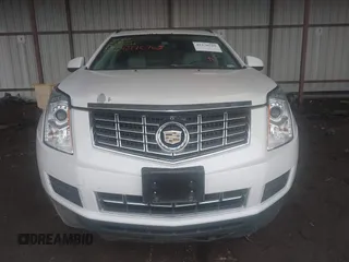 2014 Cadillac SRX z VIN 3GYFNAE32ES580480, wystawiony jako IAAI lot #42170765 z przebiegiem 148 245 mil mil oraz . Historia ofert i sprzedaży dostępna na DreamBid. Obrazek 12.