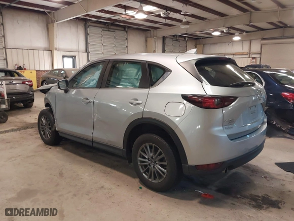 2017 Mazda CX-5 Sport with VIN JM3KFBBL1H0116157, listed as a IAAI auction lot 41584679 with 92,325 mi miles. Bid and sale history available at carsss.com. Image 3.