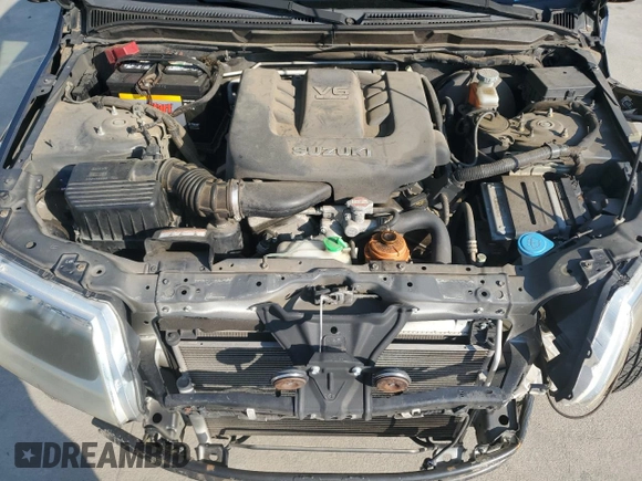 2008 Suzuki Grand Vitara z VIN JS3TE941084103091, wystawiony jako Copart lot #62013645 z przebiegiem Nie podano mil oraz Szkoda całkowita • Salvage title. Historia ofert i sprzedaży dostępna na DreamBid. Obrazek 12.