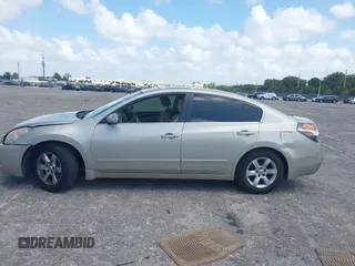 2009 Nissan Altima S with VIN 1N4AL21E59N544078, listed as a IAAI auction lot 41948389 with 149,484 mi miles and . Bid and sale history available at DreamBid. Image 14.