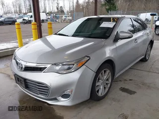 2014 Toyota Avalon Limited with VIN 4T1BK1EB3EU104576, listed as a IAAI auction lot 41773431 with 105,419 mi miles. Bid and sale history available at carsss.com. Image 2.