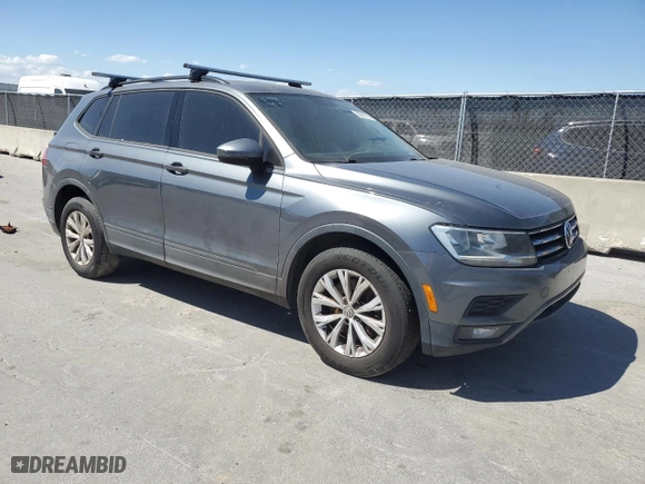2018 Volkswagen Tiguan S with VIN 3VV1B7AX4JM037328, listed as a Copart auction lot 50067275 with 213,669 mi miles and Clean Title. Bid and sale history available at carsss.com. Image 4.
