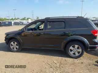 2012 Dodge Journey SXT z VIN 3C4PDCBG0CT290763, wystawiony jako IAAI lot #42553350 z przebiegiem 152 943 mil mil oraz . Historia ofert i sprzedaży dostępna na DreamBid. Obrazek 14.