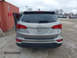 2017 Hyundai Santa Fe 2.4L with VIN 5XYZU3LB4HG424734, listed as a IAAI auction lot 41491166 with 130,905 mi miles and . Bid and sale history available at DreamBid. Image 16.