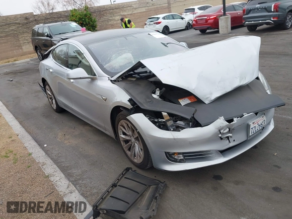 2017 Tesla Model S 60 with VIN 5YJSA1E17HF189627, listed as a IAAI auction lot 41891766 with 106,003 mi miles and . Bid and sale history available at DreamBid. Image 1.