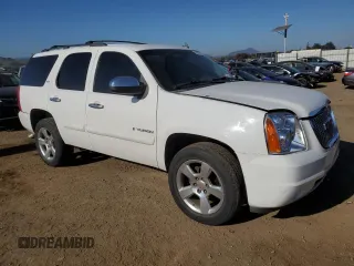 2008 GMC Yukon SLT 4SA z VIN 1GKFK13028J192313, wystawiony jako Copart lot #89207235 z przebiegiem 240 812 mil mil oraz Szkoda całkowita • Salvage title. Historia ofert i sprzedaży dostępna na DreamBid. Obrazek 4.
