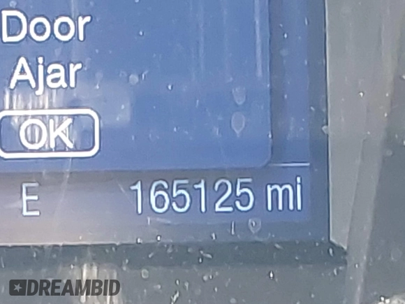 2013 Ford Taurus SEL with VIN 1FAHP2E8XDG191132, listed as a IAAI auction lot 41833542 with 165,125 mi miles. Bid and sale history available at carsss.com. Image 15.