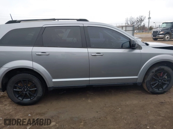 2019 Dodge Journey SE with VIN 3C4PDCBG9KT869149, listed as a IAAI auction lot 41472289 with 97,333 mi miles and . Bid and sale history available at DreamBid. Image 14.