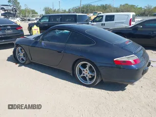 2003 Porsche 911 Carrera with VIN WP0AA29953S620592, listed as a IAAI auction lot 41808347 with 117,175 mi miles. Bid and sale history available at carsss.com. Image 3.