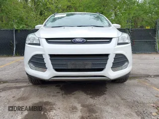 2016 Ford Escape SE with VIN 1FMCU9GX1GUC04085, listed as a IAAI auction lot 42126826 with 130,728 mi miles. Bid and sale history available at carsss.com. Image 6.