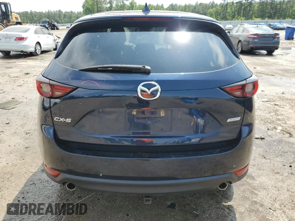 2018 Mazda CX-5 Grand Touring with VIN JM3KFADM3J1312519, listed as a Copart auction lot 56276685 with 109,486 mi miles and Clean title. Bid and sale history available at DreamBid. Image 6.