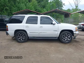 2005 GMC Yukon SLT z VIN 1GKEC13T75R114660, wystawiony jako IAAI lot #42223845 z przebiegiem 199 064 mil mil oraz . Historia ofert i sprzedaży dostępna na DreamBid. Obrazek 13.