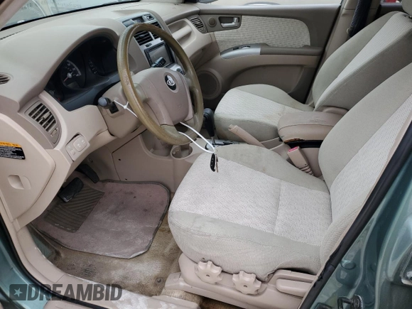 2005 Kia Sportage LX with VIN KNDJE723557062868, listed as a Copart auction lot 41758315 with 184,368 mi miles and Clean Title. Bid and sale history available at carsss.com. Image 7.