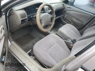 1999 Chevrolet Prizm z VIN 1Y1SK5284XZ403676, wystawiony jako Copart lot #57961725 z przebiegiem Nie podano mil oraz Szkody całkowita. Historia ofert i sprzedaży dostępna na DreamBid. Obrazek 8.